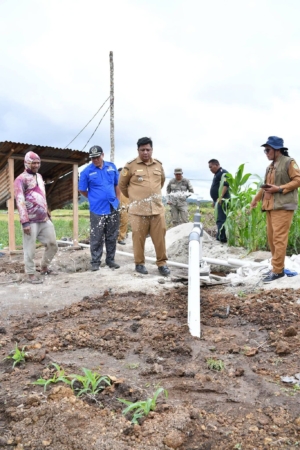 Pembangunan Jaringan listrik dan pompa air di Kawasan Pertanian Terpadu (KPT) Desa Hariara Pintu, Kecamatan Harian.(ist)