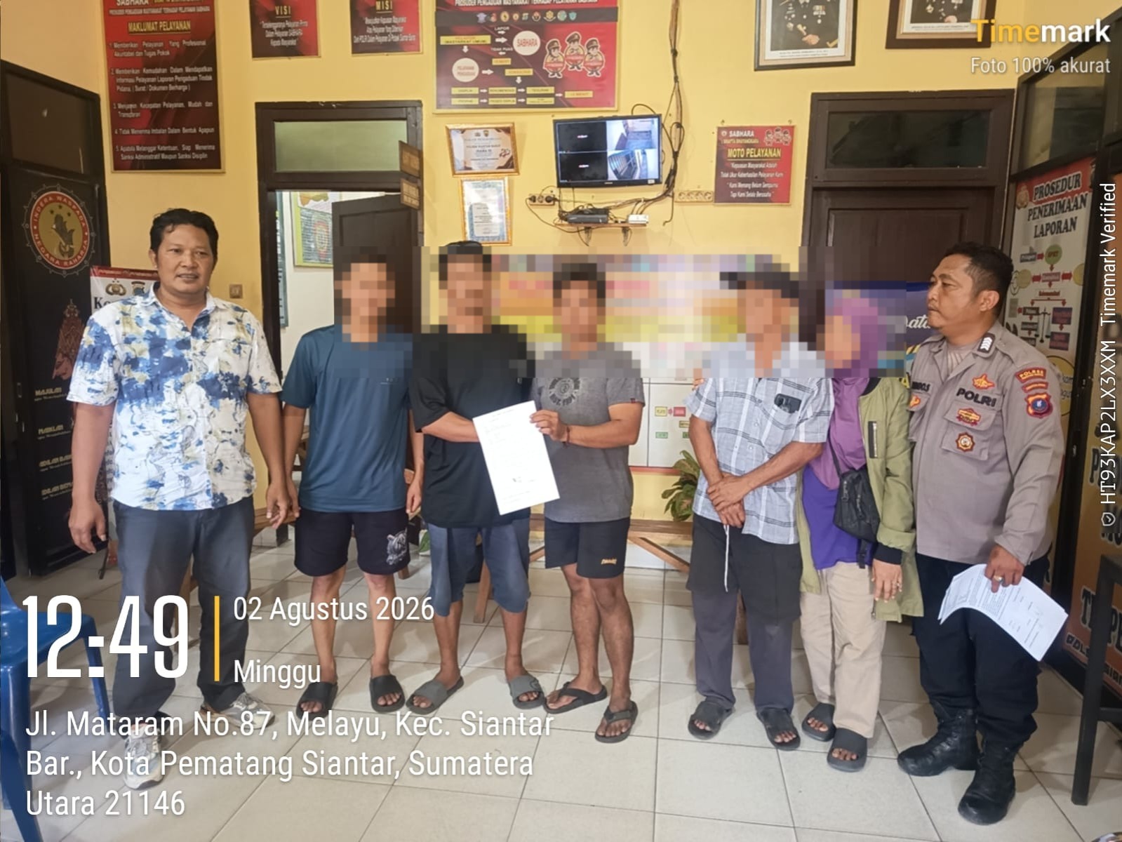 Perdamaian kedua belah pihak dugaan kasus penganiayaan berdamai di Mapolsek Siantar Barat.(ist)