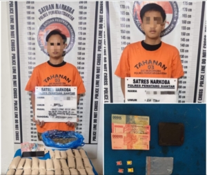 Polisi amankan ke 2 terduka pelaku kepemilikan narkotika jenis Ganja dan ekstasi berikut barang bukti.(ist)